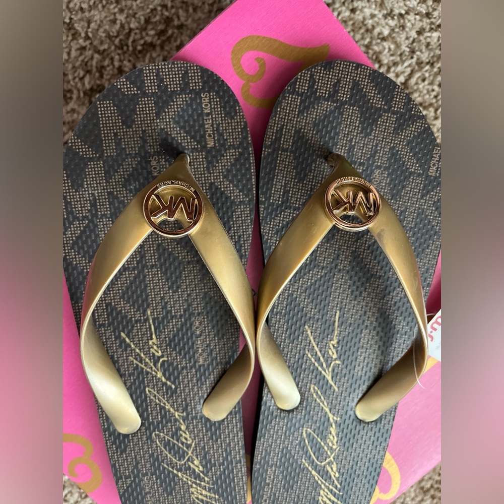 Michael Kors flip flops NWT Size 9